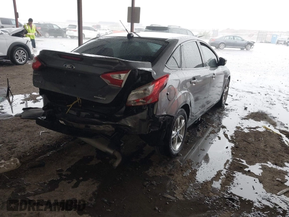2013 Ford Focus SE with VIN 1FADP3F29DL243937, listed as a IAAI auction lot 42145911 with 90,376 mi miles and . Bid and sale history available at DreamBid. Image 4.