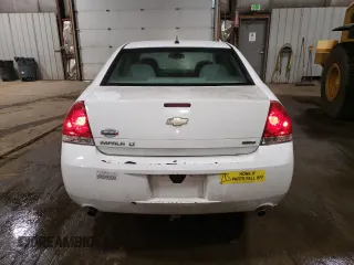 2014 Chevrolet Impala LT with VIN 2G1WB5E37E1100847, listed as a Copart auction lot 58580765 with 104,949 mi miles and Salvage title. Bid and sale history available at DreamBid. Image 6.