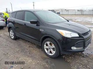 2013 Ford Escape SE with VIN 1FMCU9G94DUA21681, listed as a IAAI auction lot 42057896 with 197,257 mi miles. Bid and sale history available at carsss.com. Image 1.