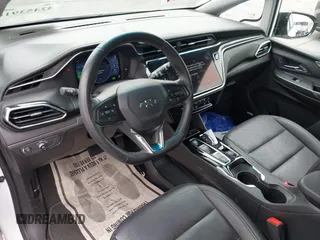2023 Chevrolet Bolt EV 2LT z VIN 1G1FX6S07P4198027, wystawiony jako IAAI lot #42453916 z przebiegiem 5 133 mil mil oraz . Historia ofert i sprzedaży dostępna na DreamBid. Obrazek 22.