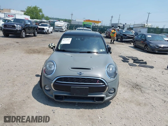 2019 MINI Hardtop 4 Door Cooper S with VIN WMWXU3C57K2H54547, listed as a IAAI auction lot 42492037 with 74,657 mi miles and . Bid and sale history available at DreamBid. Image 13.