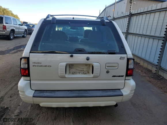 2000 Isuzu Rodeo S with VIN 4S2CK58W8Y4340907, listed as a Copart auction lot 79683804 with 153,419 mi miles and Salvage Title. Bid and sale history available at carsss.com. Image 6.
