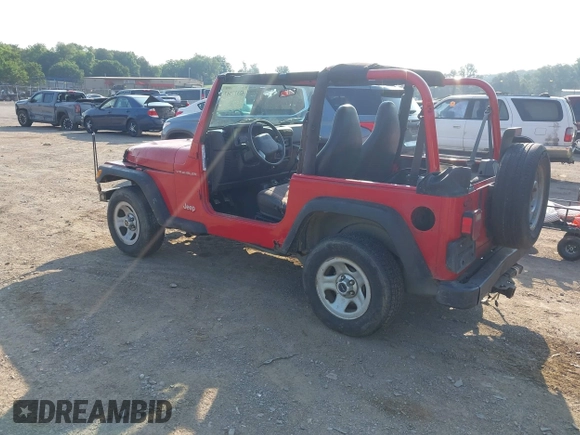 2000 Jeep Wrangler SE with VIN 1J4FA29P6YP775127, listed as a IAAI auction lot 42377387 with Not provided miles and . Bid and sale history available at DreamBid. Image 3.