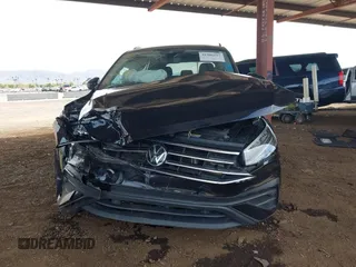 2022 Volkswagen Tiguan SE with VIN 3VV3B7AX4NM109997, listed as a IAAI auction lot 41906297 with 62,692 mi miles and . Bid and sale history available at DreamBid. Image 6.