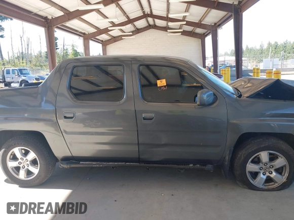 2007 Honda Ridgeline RTL with VIN 2HJYK16537H529904, listed as a IAAI auction lot 42626859 with 294,953 mi miles and . Bid and sale history available at DreamBid. Image 13.