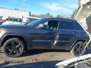 2015 Jeep Grand Cherokee Laredo with VIN 1C4RJFAG8FC135253, listed as a IAAI auction lot 41169128 with 110,478 mi miles. Bid and sale history available at carsss.com. Image 15.
