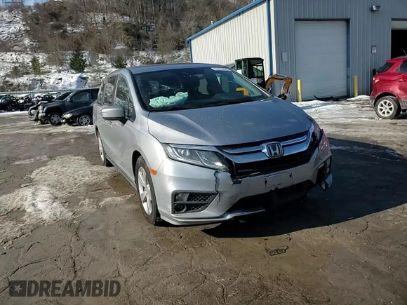 2019 Honda Odyssey EX with VIN 5FNRL6H59KB074264, listed as a Copart auction lot 87653495 with 104,422 mi miles and Salvage Title. Bid and sale history available at carsss.com. Image 12.