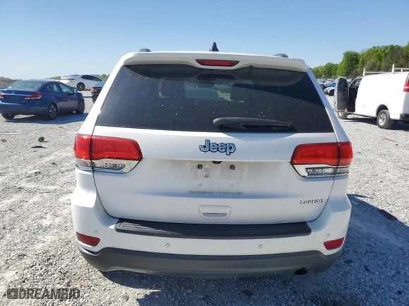 2017 Jeep Grand Cherokee Laredo with VIN 1C4RJEAGXHC717464, listed as a Copart auction lot 53091185 with 140,542 mi miles and Clean Title. Bid and sale history available at carsss.com. Image 6.