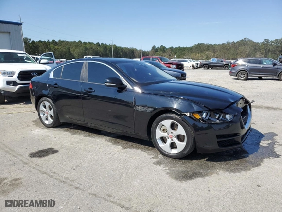 2018 Jaguar XE 25t with VIN SAJAR4FX1JCP34265, listed as a Copart auction lot 75248994 with 69,215 mi miles and Salvage Title. Bid and sale history available at carsss.com. Image 4.