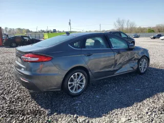 2019 Ford Fusion SE with VIN 3FA6P0HD9KR158973, listed as a Copart auction lot 50158435 with 76,956 mi miles and Salvage Title. Bid and sale history available at DreamBid. Image 3.