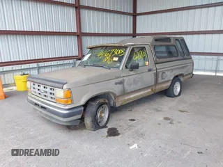 1992 Ford Ranger XLT with VIN 1FTCR10X5NUA12182, listed as a IAAI auction lot 42623003 with Not provided miles and . Bid and sale history available at DreamBid. Image 2.