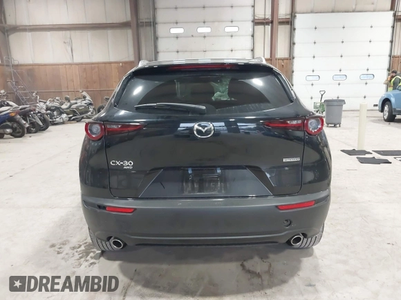 2025 Mazda CX-30 S Select Sport with VIN 3MVDMBBM2SM755621, listed as a IAAI auction lot 41945799 with 2,401 mi miles and . Bid and sale history available at DreamBid. Image 17.