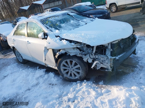 2014 Toyota Camry Hybrid LE with VIN 4T1BD1FK7EU114181, listed as a IAAI auction lot 41294936 with 115,986 mi miles. Bid and sale history available at carsss.com. Image 1.