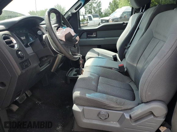 2014 Ford F-150 XL with VIN 1FTFX1ET0EKD17173, listed as a Copart auction lot 59056345 with 185,804 mi miles and Salvage title. Bid and sale history available at DreamBid. Image 7.