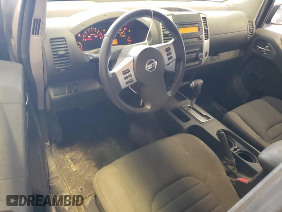 2015 Nissan Frontier SV with VIN 1N6BD0CT1FN713999, listed as a Copart auction lot 62053944 with 104,667 mi miles and Salvage title. Bid and sale history available at DreamBid. Image 8.