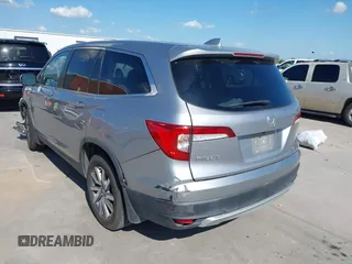 2020 Honda Pilot EX-L with VIN 5FNYF5H46LB004744, listed as a IAAI auction lot 42095298 with 76,159 mi miles and . Bid and sale history available at DreamBid. Image 3.
