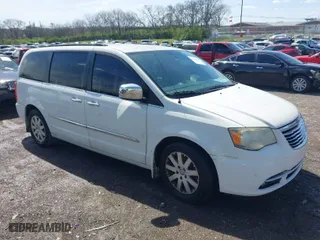 2012 Chrysler Town & Country Touring-L with VIN 2C4RC1CG4CR270789, listed as a IAAI auction lot 41879185 with NaN miles. Bid and sale history available at carsss.com. Image 1.