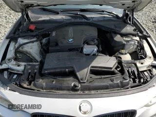 2015 BMW 3 Series 328i xDrive with VIN WBA3B3G52FNT19323, listed as a Copart auction lot 61873015 with 110,893 mi miles and Salvage title. Bid and sale history available at DreamBid. Image 11.