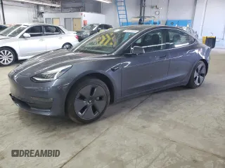 2021 Tesla Model 3 Long Range z VIN 5YJ3E1EB3MF848122, wystawiony jako Copart lot #56423005 z przebiegiem 57 619 mil mil oraz Szkoda całkowita • Salvage title. Historia ofert i sprzedaży dostępna na DreamBid. Obrazek 1.