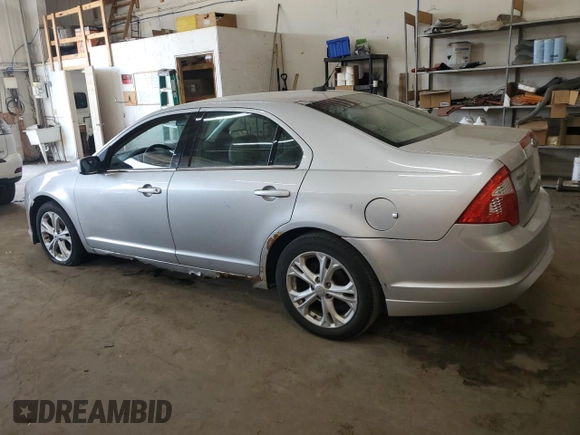 2012 Ford Fusion SE with VIN 3FAHP0HA0CR357541, listed as a Copart auction lot 63001985 with 249,794 mi miles and Clean title. Bid and sale history available at DreamBid. Image 2.