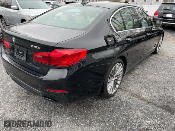 2017 BMW 5 Series 540i xDrive with VIN WBAJE7C36HG890783, listed as a Copart auction lot 55098475 with 128,332 mi miles and Clean title. Bid and sale history available at DreamBid. Image 4.