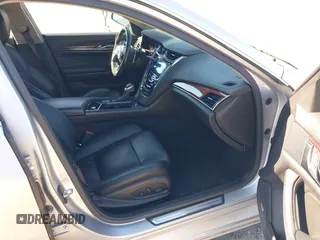 2014 Cadillac CTS Luxury AWD with VIN 1G6AX5S34E0124464, listed as a IAAI auction lot 42298607 with 89,351 mi miles and . Bid and sale history available at DreamBid. Image 5.