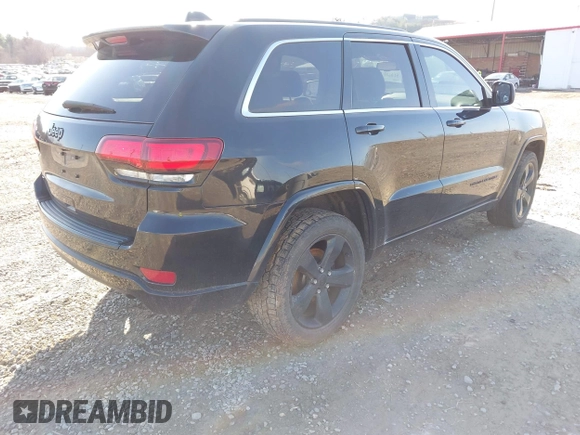 2015 Jeep Grand Cherokee Laredo with VIN 1C4RJFAG6FC171751, listed as a IAAI auction lot 41487935 with 134,113 mi miles. Bid and sale history available at carsss.com. Image 4.