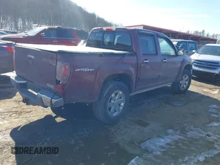 2009 GMC Canyon SLE1 with VIN 1GTDS13E898136772, listed as a IAAI auction lot 41406981 with 190,691 mi miles. Bid and sale history available at carsss.com. Image 4.