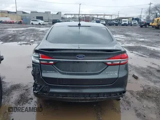 2017 Ford Fusion Hybrid Titanium z VIN 3FA6P0RU6HR279726, wystawiony jako IAAI lot #41736889 z przebiegiem 123 698 mil mil oraz . Historia ofert i sprzedaży dostępna na DreamBid. Obrazek 16.
