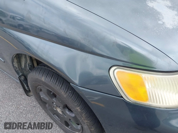 2003 Honda Odyssey EX-L with VIN 5FNRL18963B059910, listed as a IAAI auction lot 42415037 with 267,600 mi miles and . Bid and sale history available at DreamBid. Image 12.