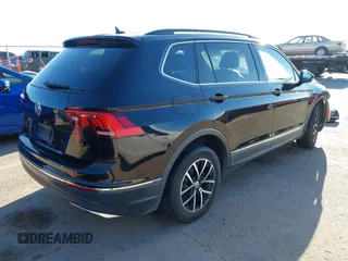 2021 Volkswagen Tiguan SE z VIN 3VV3B7AX0MM080853, wystawiony jako IAAI lot #42406539 z przebiegiem 73 295 mil mil oraz . Historia ofert i sprzedaży dostępna na DreamBid. Obrazek 4.