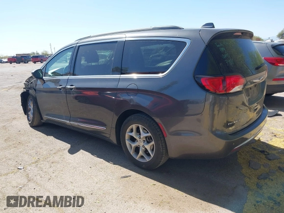 2017 Chrysler Pacifica Touring L with VIN 2C4RC1BG0HR826881, listed as a IAAI auction lot 42171240 with 214,188 mi miles and . Bid and sale history available at DreamBid. Image 3.