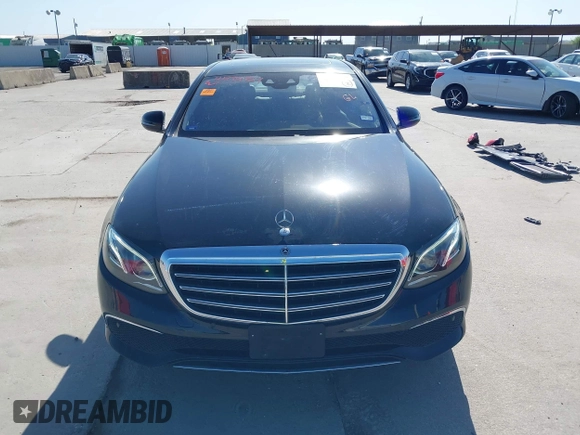 2018 Mercedes-Benz E 300 with VIN WDDZF4JB2JA351345, listed as a IAAI auction lot 41974757 with 53,948 mi miles and . Bid and sale history available at DreamBid. Image 13.