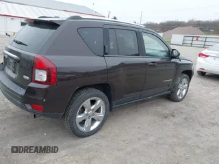 2014 Jeep Compass Latitude with VIN 1C4NJDEB5ED731057, listed as a IAAI auction lot 41938769 with 175,289 mi miles and . Bid and sale history available at carsss.com. Image 4.