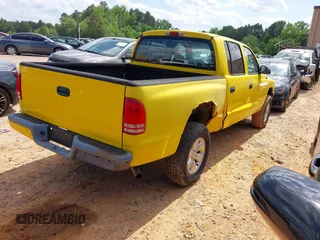 2004 Dodge Dakota Sport z VIN 1D7HG38N14S752273, wystawiony jako IAAI lot #42311042 z przebiegiem 157 402 mil mil oraz . Historia ofert i sprzedaży dostępna na DreamBid. Obrazek 4.