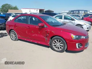 2016 Mitsubishi Lancer ES with VIN JA32U2FU6GU011198, listed as a IAAI auction lot 41932443 with 122,991 mi miles. Bid and sale history available at carsss.com. Image 1.