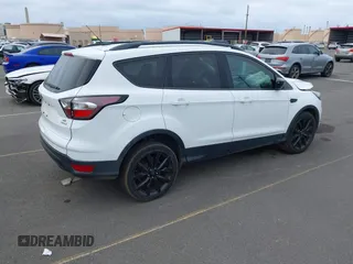 2018 Ford Escape SE with VIN 1FMCU0GD9JUA04709, listed as a IAAI auction lot 41831359 with 62,638 mi miles. Bid and sale history available at carsss.com. Image 4.