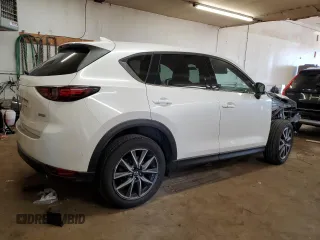 2018 Mazda CX-5 Grand Touring with VIN JM3KFBDM6J0455993, listed as a Copart auction lot 61414275 with 77,570 mi miles and Salvage title. Bid and sale history available at DreamBid. Image 3.