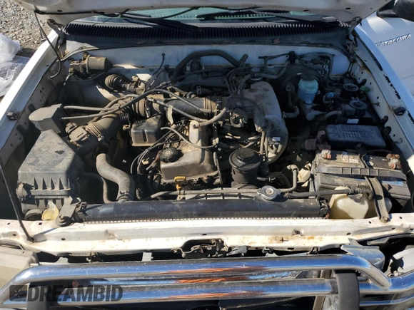 1999 Toyota Tacoma PreRunner with VIN 4TASM92N0XZ559544, listed as a Copart auction lot 86626024 with 209,794 mi miles and Salvage title. Bid and sale history available at DreamBid. Image 11.