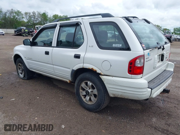 2000 Isuzu Rodeo z VIN 4S2DM58W6Y4312571, wystawiony jako IAAI lot #42253955 z przebiegiem 84 517 mil mil oraz . Historia ofert i sprzedaży dostępna na DreamBid. Obrazek 3.