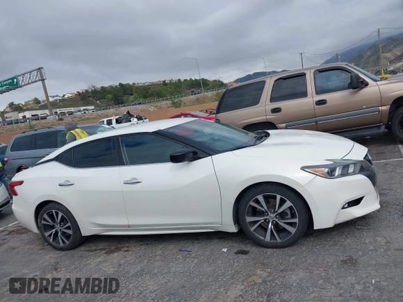 2016 Nissan Maxima SR with VIN 1N4AA6AP4GC449440, listed as a IAAI auction lot 41756271 with 136,685 mi miles and . Bid and sale history available at DreamBid. Image 13.