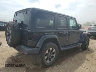 2018 Jeep Wrangler Unlimited Sahara with VIN 1C4HJXEG0JW141101, listed as a Copart auction lot 56573195 with 143,854 mi miles and Salvage title. Bid and sale history available at DreamBid. Image 3.