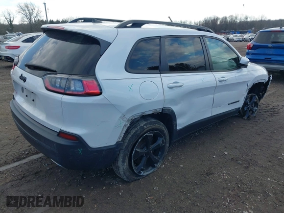 2020 Jeep Cherokee Altitude with VIN 1C4PJMLX0LD621828, listed as a IAAI auction lot 41439862 with 74,350 mi miles and . Bid and sale history available at DreamBid. Image 4.