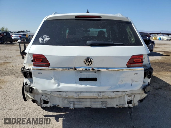 2019 Volkswagen Atlas SE with VIN 1V2DR2CA2KC533880, listed as a Copart auction lot 57353705 with 104,110 mi miles and Salvage title. Bid and sale history available at DreamBid. Image 6.