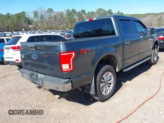 2015 Ford F-150 XLT with VIN 1FTEW1EG2FFC68540, listed as a IAAI auction lot 41586078 with 207,095 mi miles. Bid and sale history available at carsss.com. Image 4.