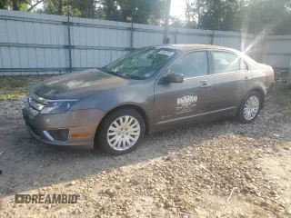 2011 Ford Fusion Hybrid с VIN 3FADP0L36BR264626, выставлен на аукционе Copart как лот 53340265 с пробегом 174 902 миль миль и Списание • Salvage title. История ставок и продаж доступна на DreamBid. Изображение 1.