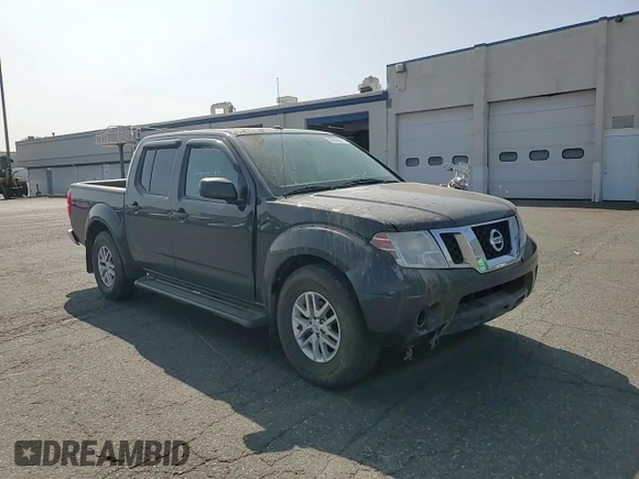 2014 Nissan Frontier SV with VIN 1N6AD0EV9EN710020, listed as a Copart auction lot 60895575 with 125,090 mi miles and Salvage title. Bid and sale history available at DreamBid. Image 13.