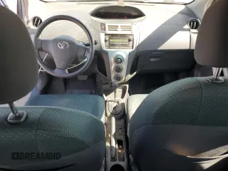 2008 Toyota Yaris with VIN JTDJT923185164654, listed as a Copart auction lot 54052575 with 242,505 mi miles and Salvage Title. Bid and sale history available at DreamBid. Image 8.