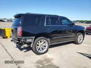 2015 GMC Yukon Denali z VIN 1GKS1CKJ8FR748131, wystawiony jako Copart lot #55213205 z przebiegiem 101 758 mil mil oraz Szkoda całkowita • Salvage title. Historia ofert i sprzedaży dostępna na DreamBid. Obrazek 3.