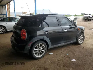 2014 MINI Countryman S with VIN WMWZC5C56EWP38065, listed as a Copart auction lot 59518395 with 91,106 mi miles and Salvage title. Bid and sale history available at DreamBid. Image 3.